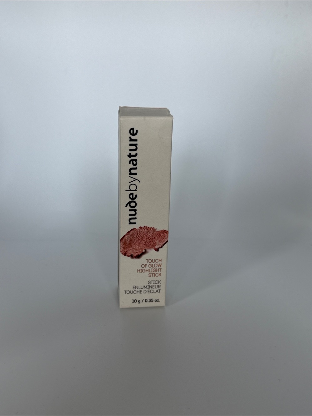 nude by nature Touch of Glow Highlight Stick — Rose